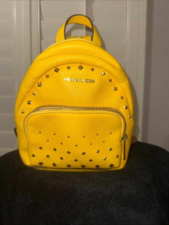 Michael Kors Handbags - Michael Kors Yellow Studded Mini Backpack